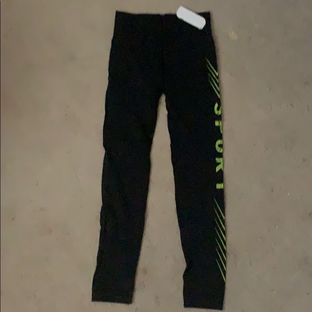 Workout leggings, black with green design on side
